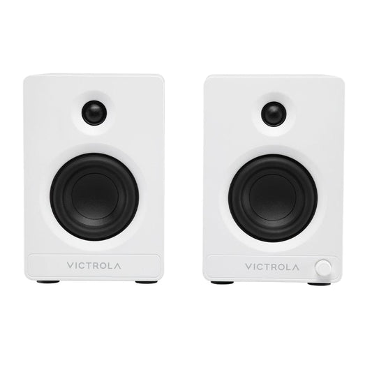 Pair of white bookshelf speakers with black tweeters and woofers, VICTROLA badge.