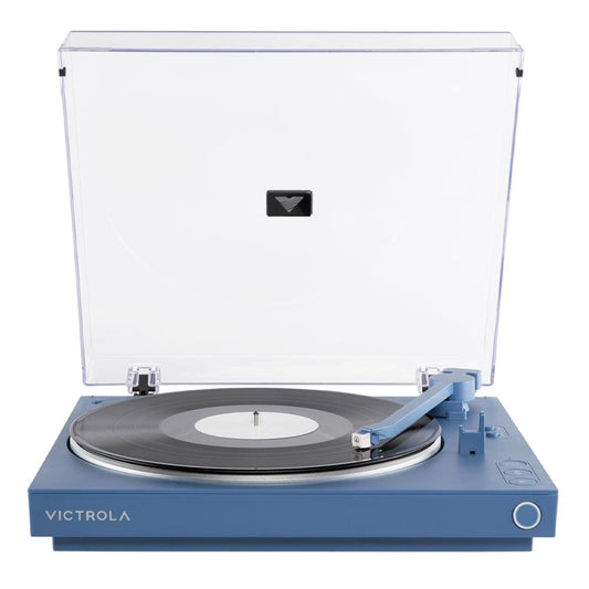 Victrola blue automatic turntable with open dust cover and black vinyl record on deck