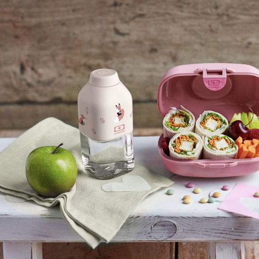 Beige Monbento reusable water bottle with fox print and translucent body