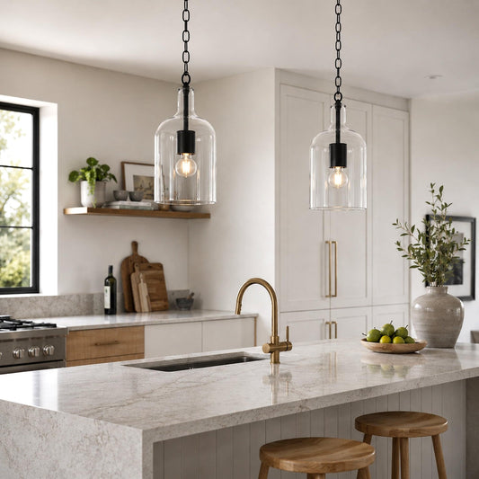 Kendal glass pendant lights with clear shades, black sockets, and hanging chains