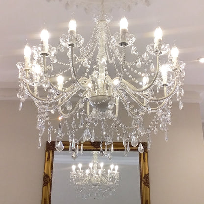 Cassie 12-light chandelier featuring clear crystal bead strands and multiple candle bulbs