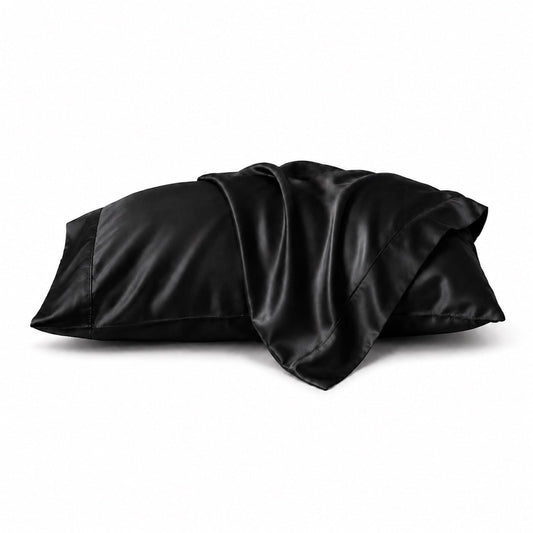 Black silky bamboo pillowcase set, two smooth satin pillowcases, folded and stacked