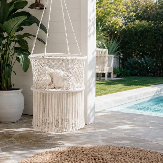 Cream macrame baby swing chair hammock with fringed body and hanging ropes