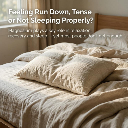 Bed pillows and folded blanket on a neatly made bed
