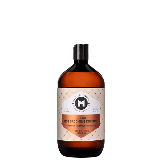 Melanie Newman Relax cologne bottle with black cap and amber liquid