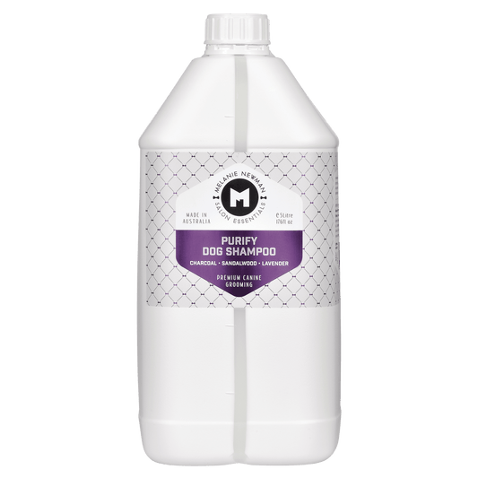 Purify dog shampoo bottle, white plastic with purple label and screw cap