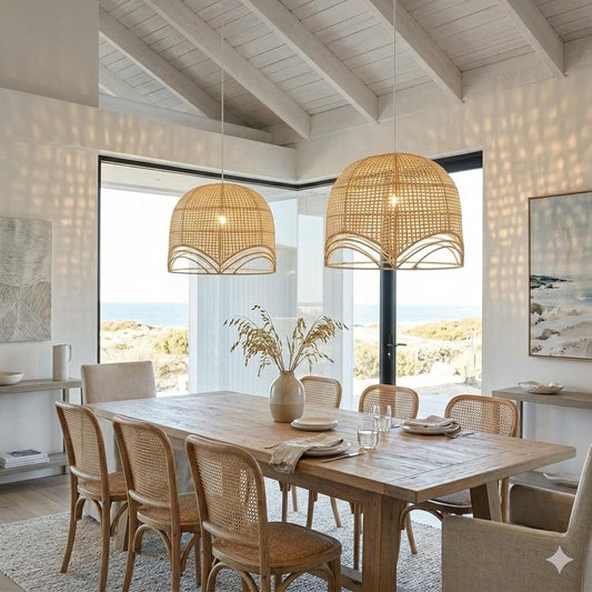 Pair of natural rattan dome pendant lights with open lattice shades and scalloped trim