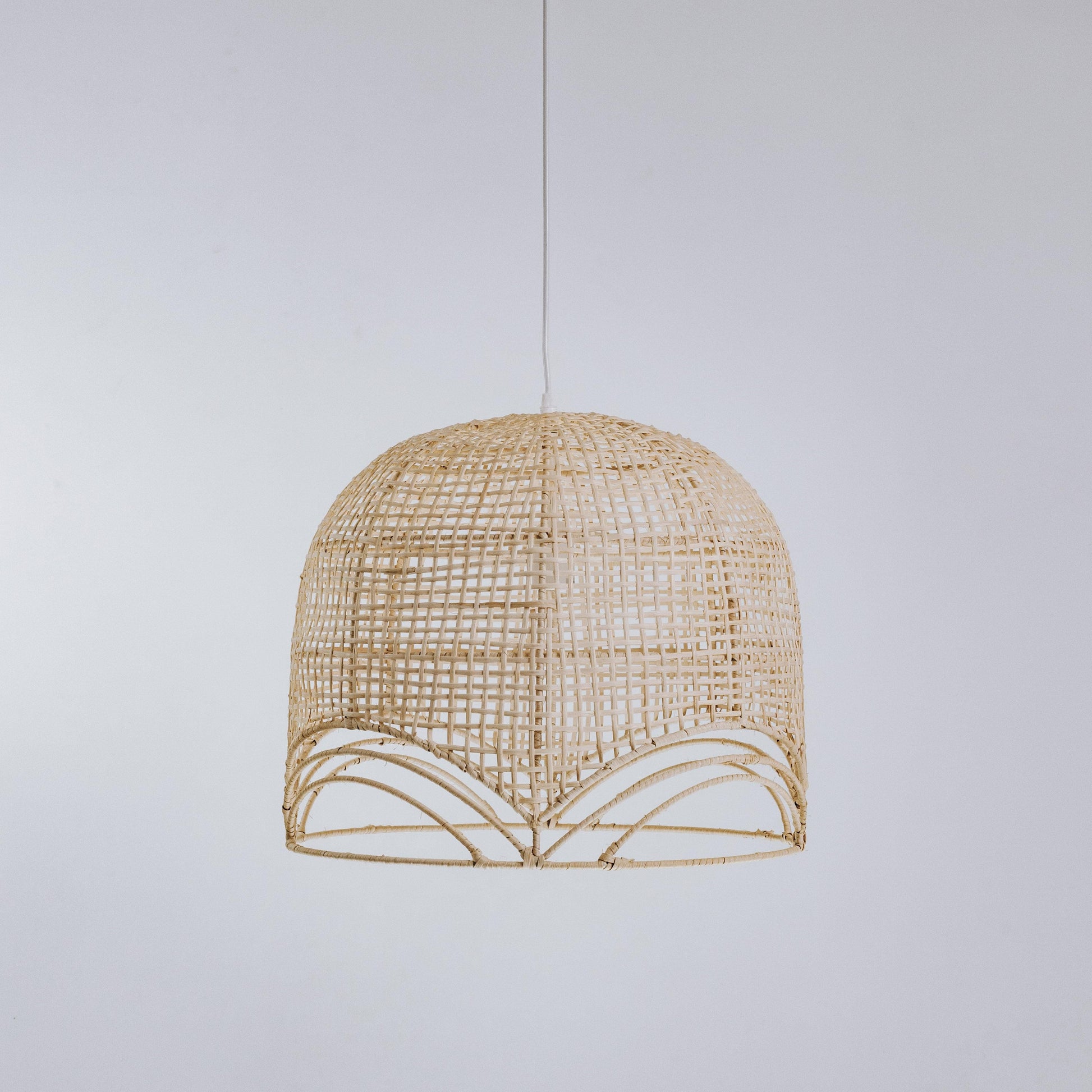 Natural rattan pendant light, small domed lattice shade with scalloped band detail