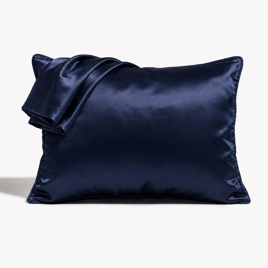 Navy satin pillowcase with envelope closure, smooth sheen fabric
