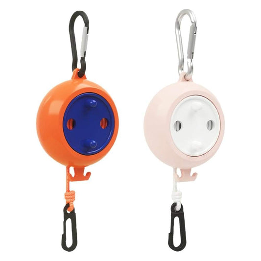 Retractable clothesline reels in orange and light pink with carabiner clips and straps