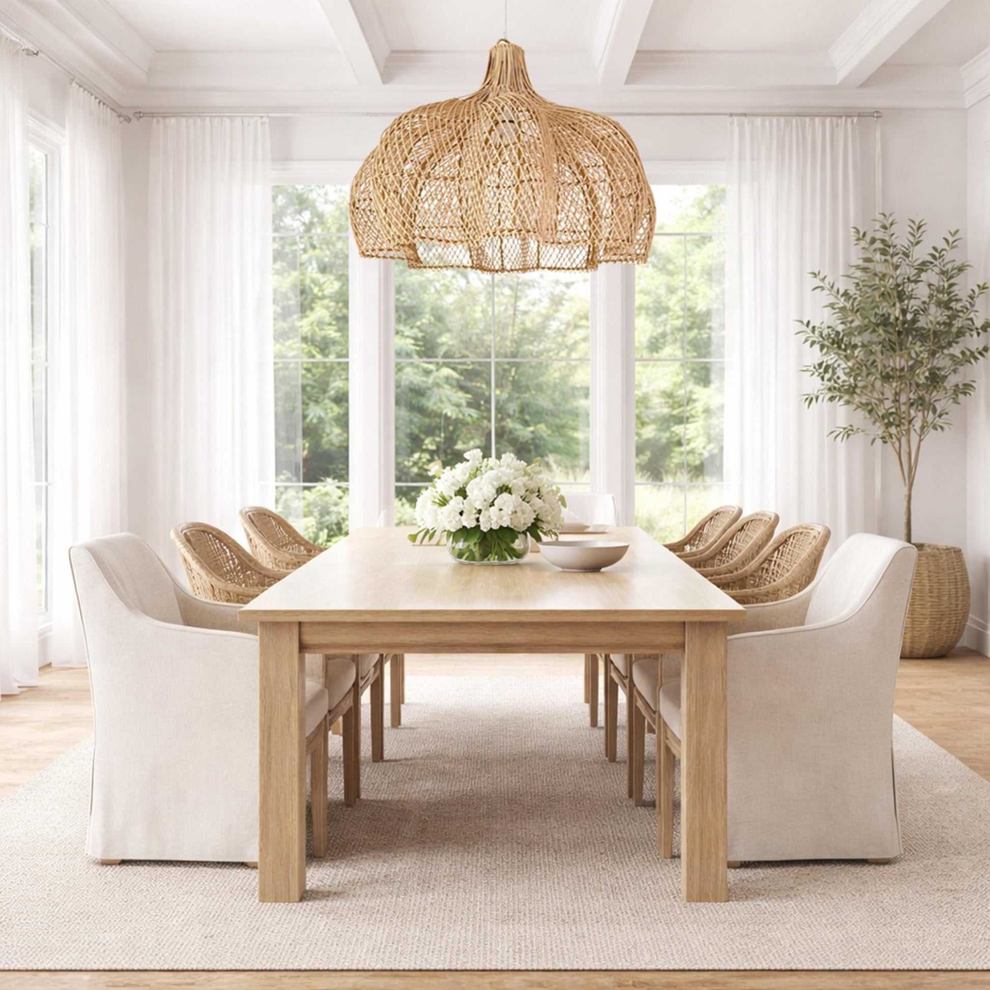 Natural rattan pendant light with dome shade, open weave pattern, and hanging cord