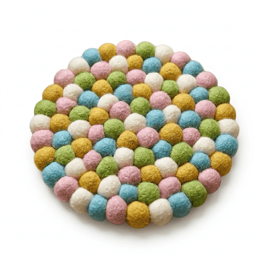 Round wool felt trivet with pastel confetti pom-poms, multicolor stitched base