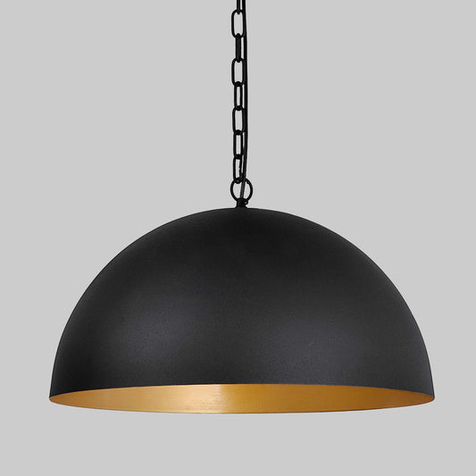 Black dome pendant light with chain, gold underside trim visible.