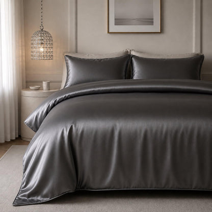 Charcoal grey satin quilt cover with smooth sheen and matching pillowcases