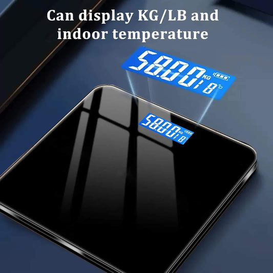 Electronic bathroom scale with dark glass platform and blue LCD showing weight and temperature