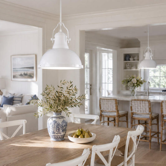 White metal pendant light with bell-shaped shade and arched suspension