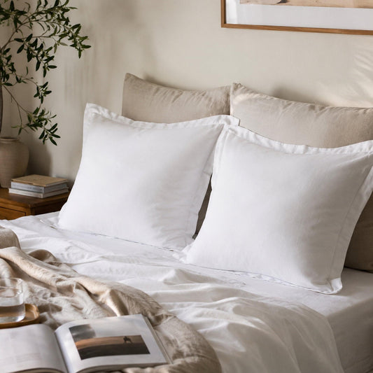 Ivory faux fur velvet European pillowcases on bed, ruffled edges, set of 2